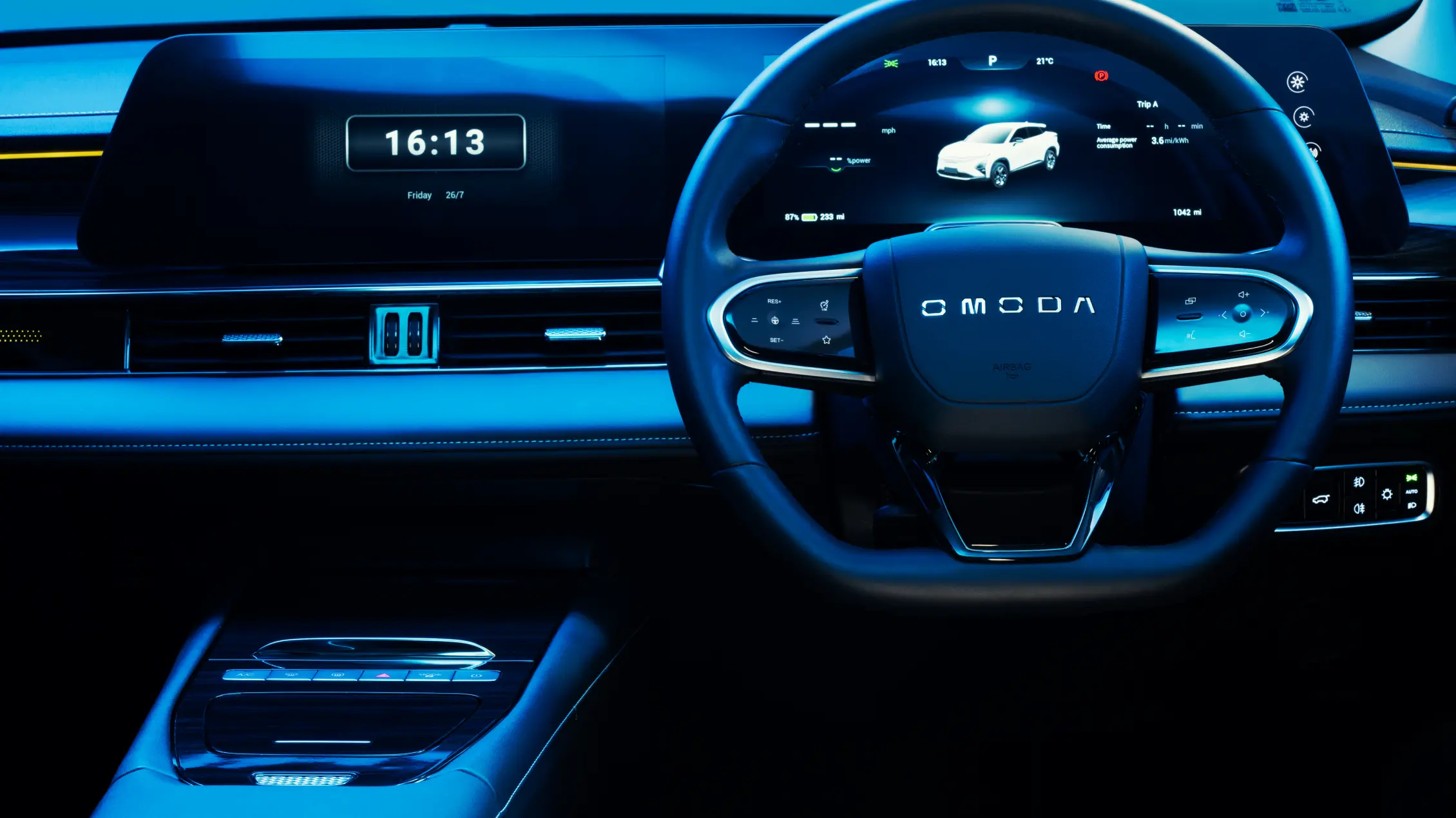 OMODA E5 interior with dashboard, console and steering wheel