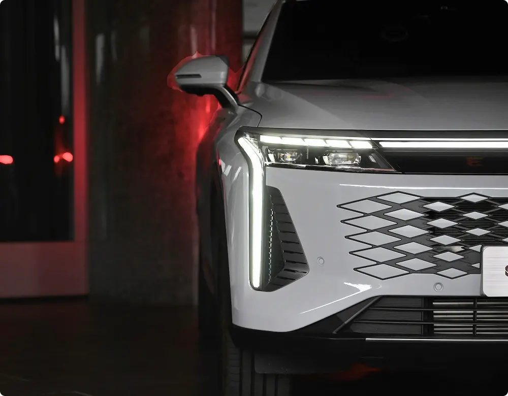 Close up of headlights on white OMODA EV