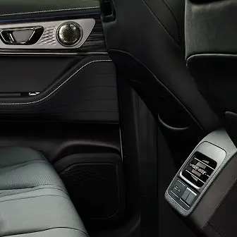 Close up of the rear footwell including the air con control for backseat passengers